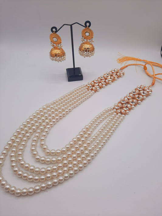 Flower shape gold plated kundan jewelry set with long maala and jhumkas - NATASHAHS