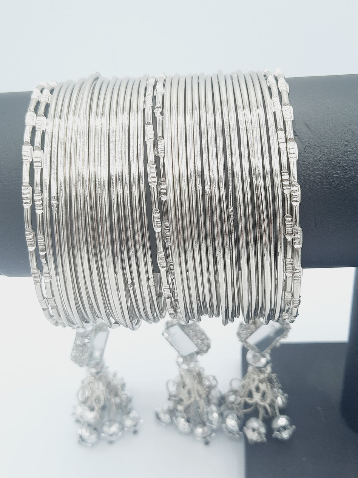 Elegant Silver-Tone Bangles with Glamorous Dangling Charms