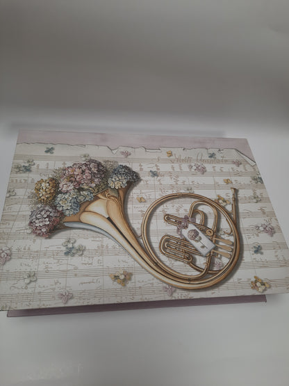 Vintage-style box or journal cover featuring a classical music aesthetic