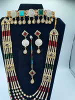 Bridal Jewelry in Golden base with multicolor precious stones