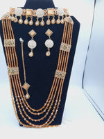 Bridal Jewelry in Golden base with Champaigne precious stones