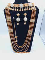 Bridal Jewelry in Golden base with Champaigne precious stones