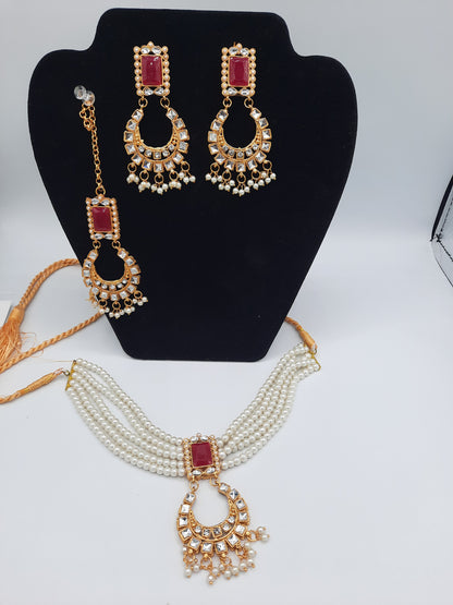 Guluband choker in pink and white colors with earrings and teeka