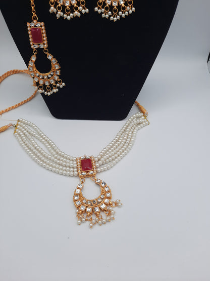 Guluband choker in pink and white colors with earrings and teeka