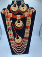 Red guluband choker with earrings and teeka