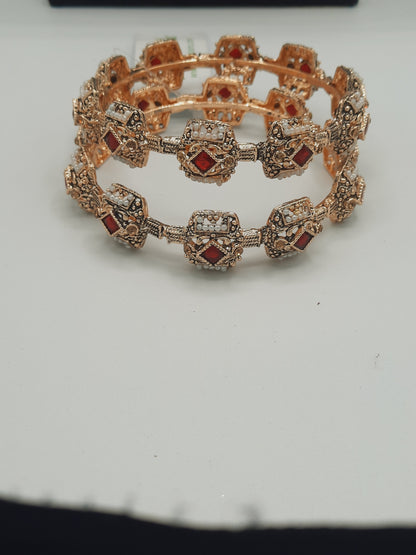 A pair of 2 Bangle 2.80 size in shades of golden and red - NATASHAHS