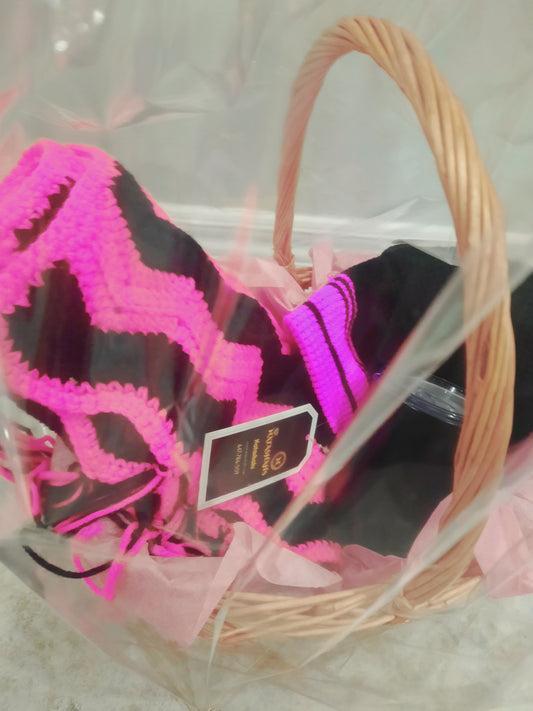 Accessories gift basket with winter scarf cap and tea mug