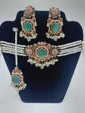 Anarkali Zircon choker set with guluband earrings and teeka in green color - NATASHAHS
