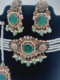 Anarkali Zircon choker set with guluband earrings and teeka in green color - NATASHAHS