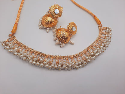 Gold-plated imitation jhumkas with white pearls and white pearls and kundan work necklace - NATASHAHS