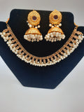 Gold-plated imitation jhumkas with white pearls and white pearls and kundan work necklace - NATASHAHS