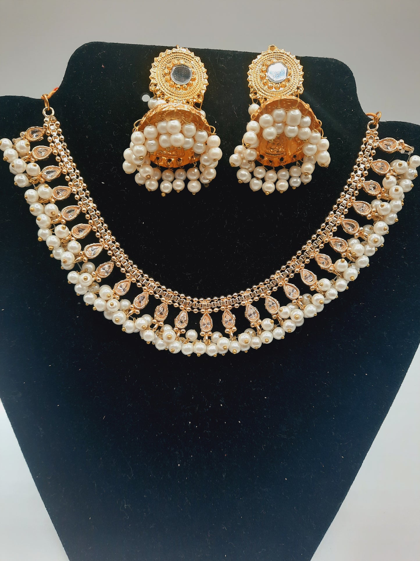 Gold-plated imitation jhumkas with white pearls and white pearls and kundan work necklace - NATASHAHS