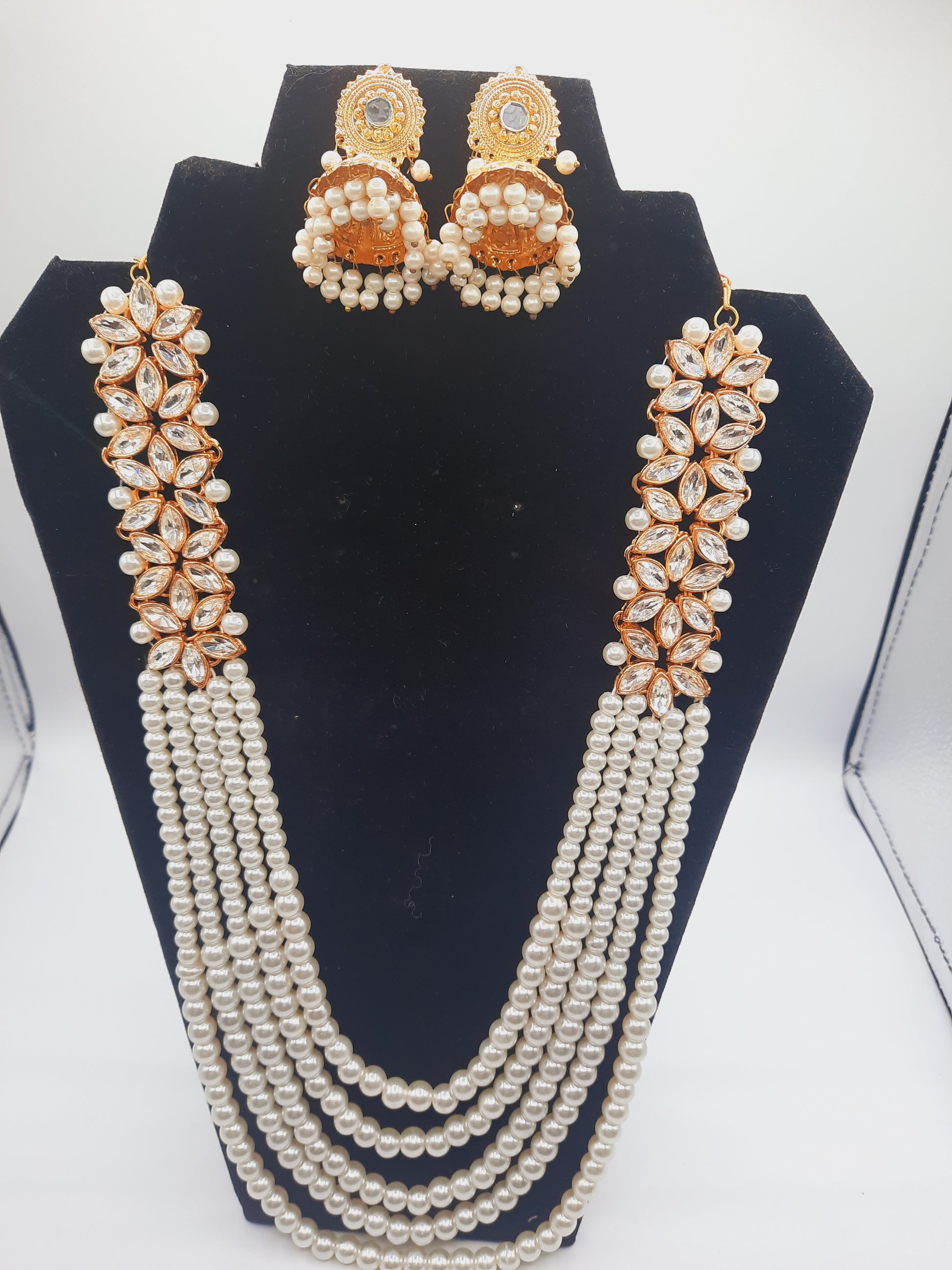 Flower shape gold plated kundan jewelry set with long maala and jhumkas - NATASHAHS