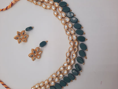 Flower shape gold plated kundan adjustable necklace with earrings in red and green color - NATASHAHS