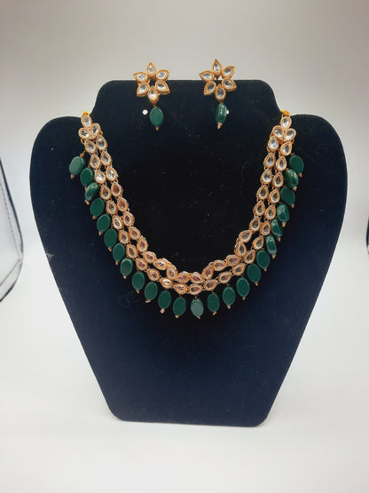 Flower shape gold plated kundan adjustable necklace with earrings in red and green color - NATASHAHS