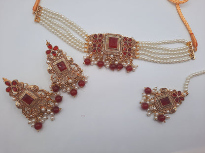 Anarkali choker set with guluband earrings and teeka in red color with gold plated tone - NATASHAHS