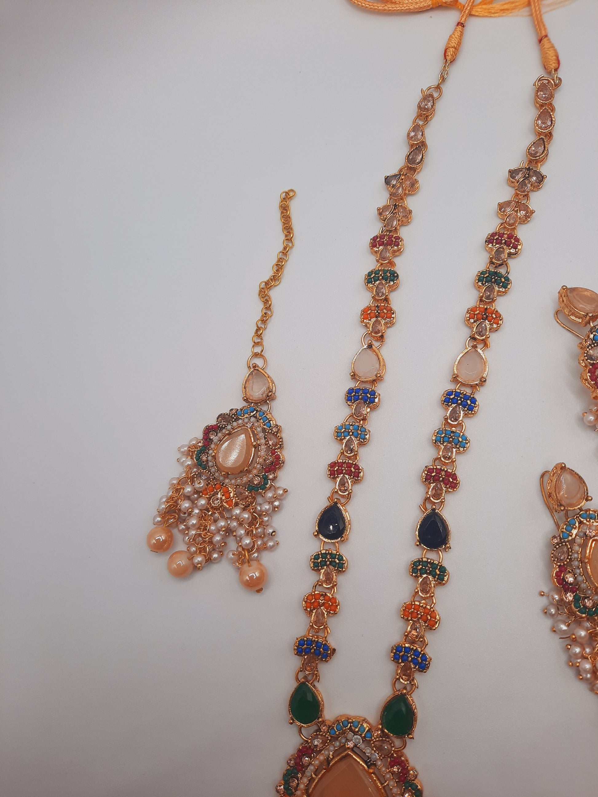 Noratan Kundan maala set with earrings and teeka for modern brides - NATASHAHS