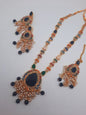 Noratan Kundan maala set with earrings and teeka for modern brides in black and green shades - NATASHAHS