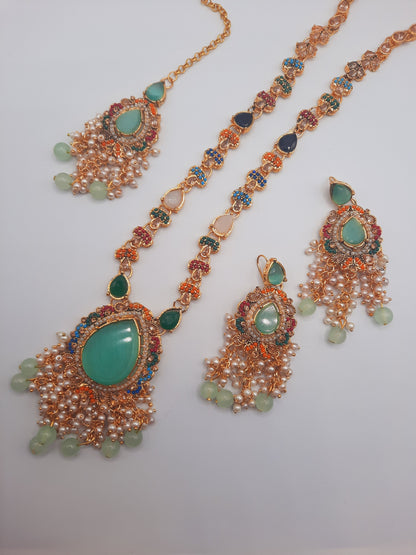 Noratan Kundan maala set with earrings and teeka for modern brides in black and green shades - NATASHAHS