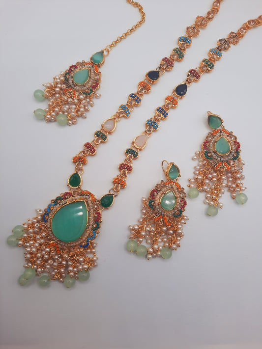 Noratan Kundan maala set with earrings and teeka for modern brides in black and green shades - NATASHAHS