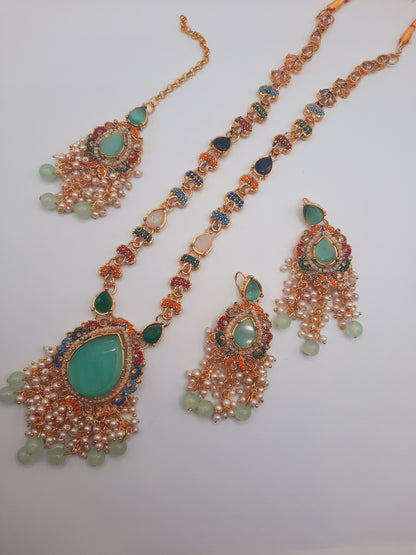 Noratan Kundan maala set with earrings and teeka for modern brides in black and green shades - NATASHAHS