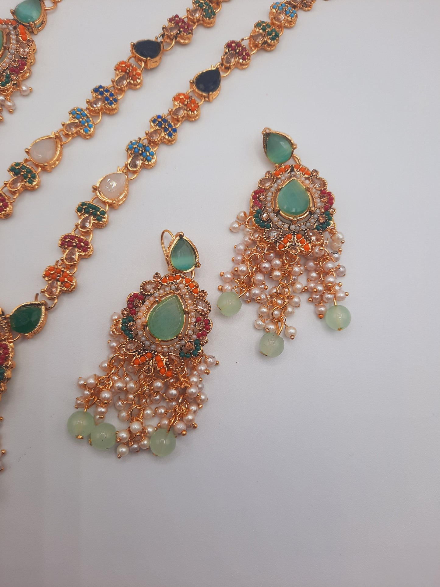 Noratan Kundan maala set with earrings and teeka for modern brides in black and green shades - NATASHAHS