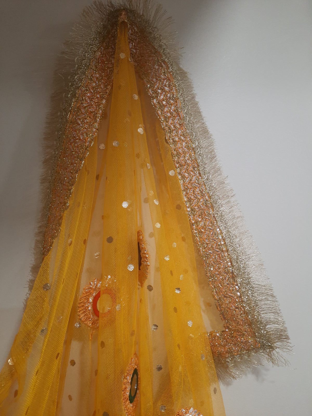 yellow net dupatta with phulkari-style mirror work embroidery
