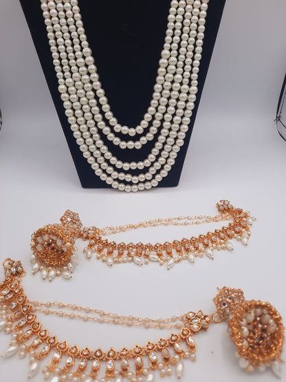 Flower shape gold plated kundan jewelry set with long maala and jhumkas
