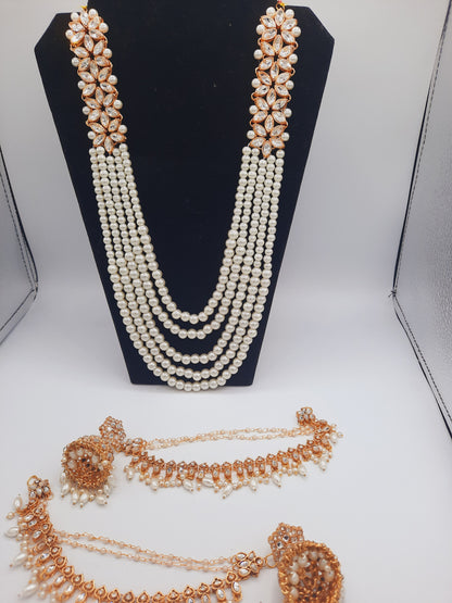 Flower shape gold plated kundan jewelry set with long maala and jhumkas