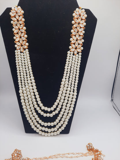 Flower shape gold plated kundan jewelry set with long maala and jhumkas