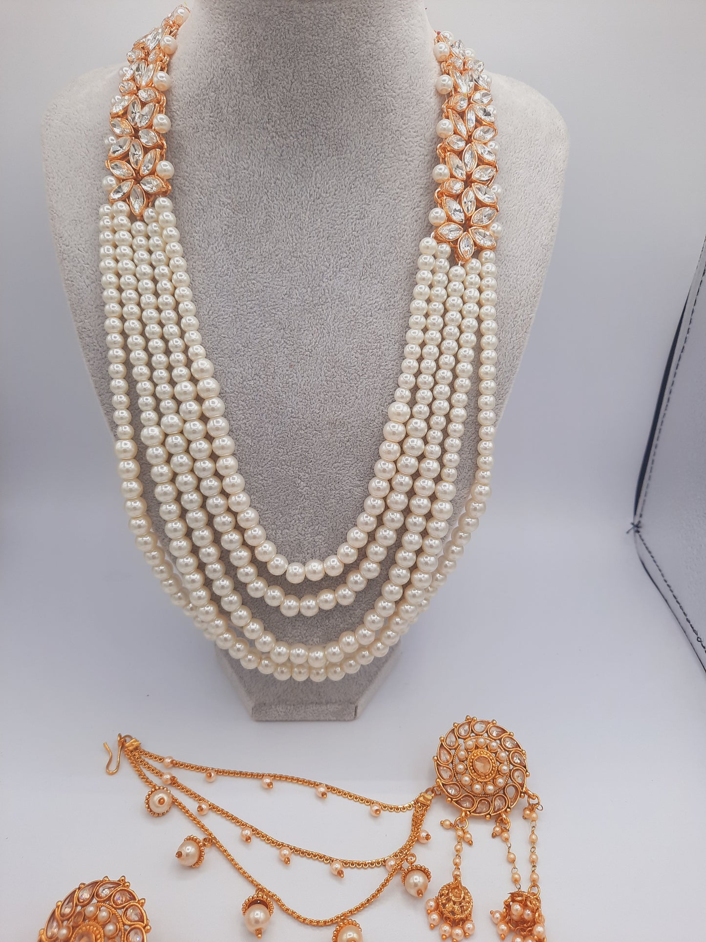 White long maala necklace with white pearls and Kundan Bali with chain and Devdas jhumkas