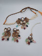 Turkish-style multi-color stone and pearl choker set with matching earrings and a maang tikka.