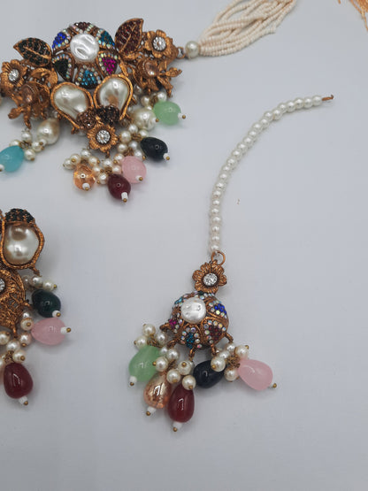 Turkish-style multi-color stone and pearl choker set with matching earrings and a maang tikka.