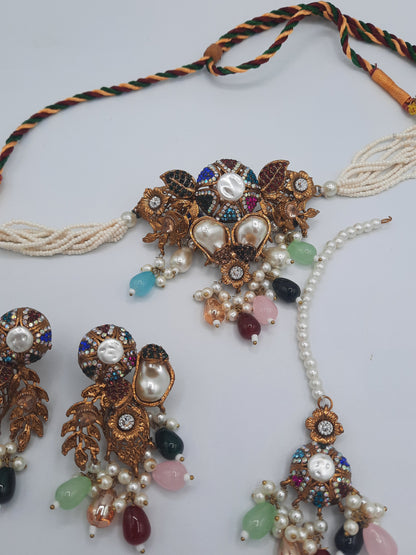 Turkish-style multi-color stone and pearl choker set with matching earrings and a maang tikka.