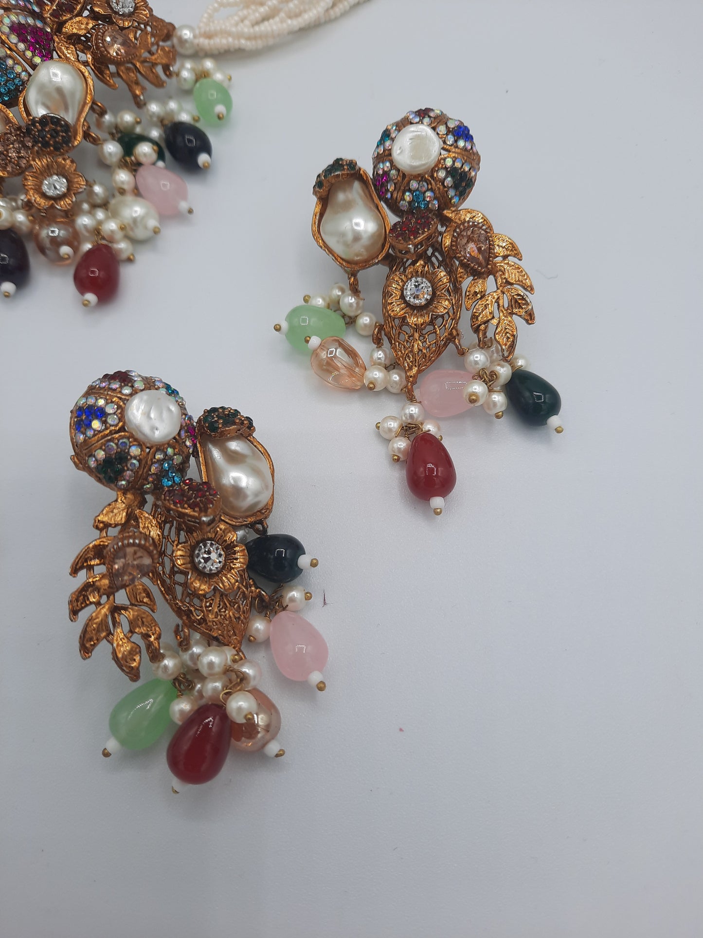 Turkish-style multi-color stone and pearl choker set with matching earrings and a maang tikka.