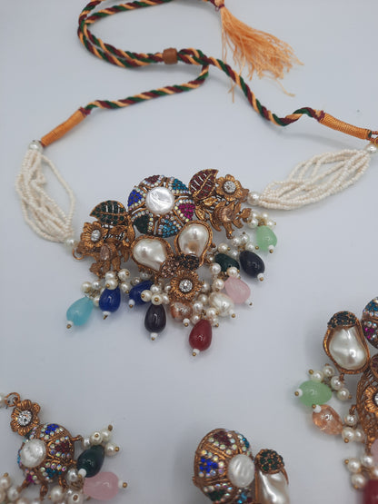Turkish-style multi-color stone and pearl choker set with matching earrings and a maang tikka.
