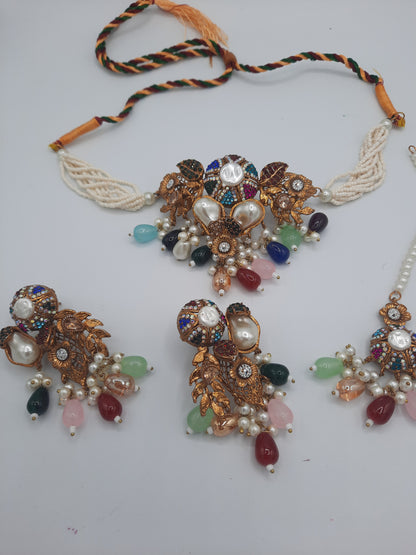 Turkish-style multi-color stone and pearl choker set with matching earrings and a maang tikka.