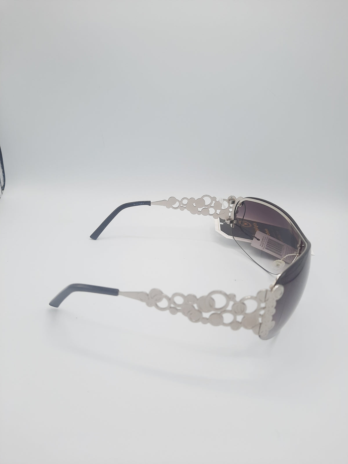 Designer fashion sunglasses with a distinctive decorative design