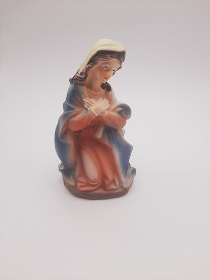 Virgin Mary nativity figurine that belongs to the same crèche collection