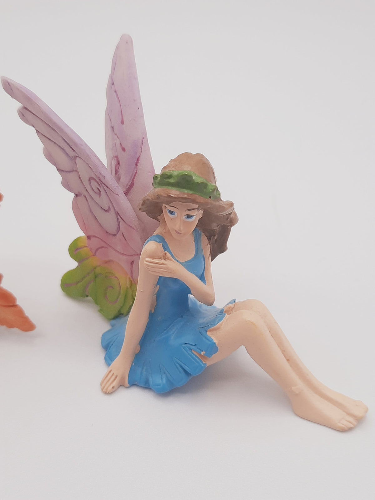 Three miniature fairy figurines styled perfectly for use as whimsical birthday or wedding cake toppers / cake decor