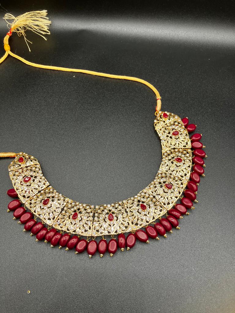 KUNDAN RED PEARLS & STONES GOLD-BASED EARRINGS WITH KUNDAN WORK CHOKER HYDERABADI STYLE JEWELRY SET