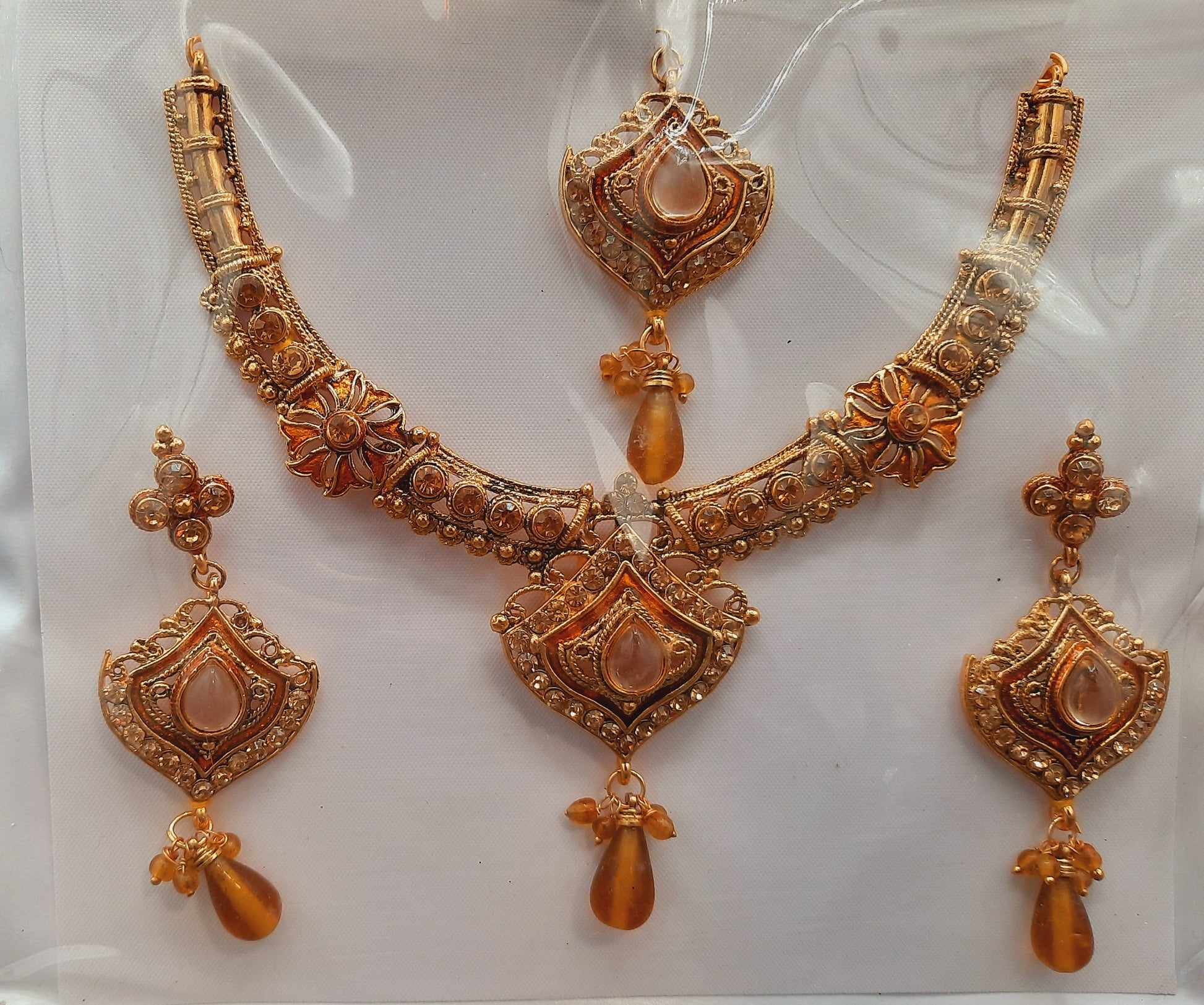 Indian Wedding party jewelry sets in golden base and meena color - NATASHAHS