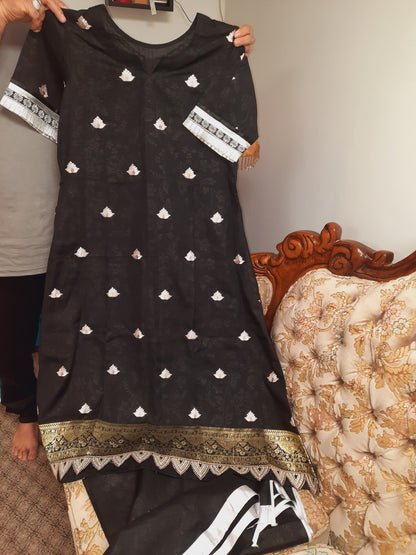 Stittched black embroidred silk cotton dress on self print cotton
